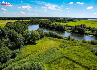 72 arų sklypas prie upės – tinka žemės ūkiui ir poilsiui