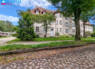Šilutės centre – 2 kamb. butas su erdviu kiemu!