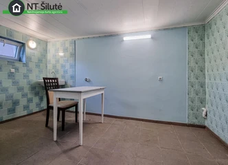 Namas su šiltomis sienomis ir šildomu židiniu