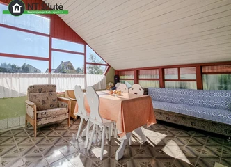 Namas su šiltomis sienomis ir šildomu židiniu