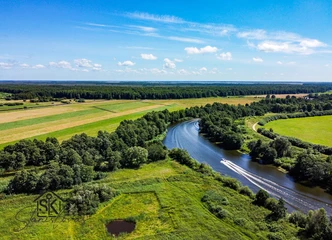 72 arų sklypas - ramybės oazė prie Minijos